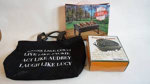 lot 95 image: Campers lot including portable table top grill new in box fire pit popcorn maker new in box black carrying tote