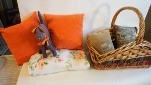 lot 98 image: Large basket of pillows and vintage blanket