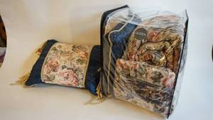 lot 100 image: Queen size floral quilt bed cover with pillow shams and two decorative pillows slightly used