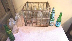 lot 153 image: Metal crate with milk bottles