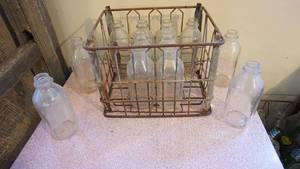 lot 154 image: Metal crate with milk bottles