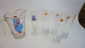 lot 181 image: Heilemanns old style glass beer pitcher, set of Four-9 inch Crispin hard apple cider glasses, one Lite beer glass