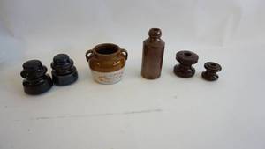 lot 189 image: Old charm gay 90s 4 inch crock, four porcelain insulators,  6 12  inch Harrington Southend pottery bottle