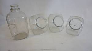lot 199 image: Vintage glass half gallon liquid pitcher, Three-6 inch candy counter glass jars