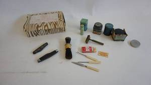 lot 204 image: Vintage medicine cabinet advertising tens, shaving accessories, pocket knife etc.