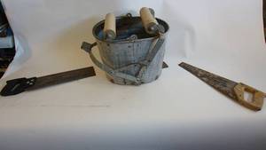 lot 206 image: Vintage metal mop bucket, two vintage hand saws