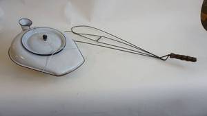 lot 231 image: Antique rug beater, white enamel bed pan with lid converted to a wall hanger
