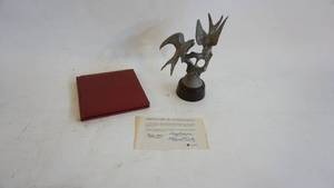 lot 281 image: Pewter Figurine The Barn Swallows by Irving Burgues, 1976  Limited Edition 8 Statue  Includes Authenticity Papers and Original Book