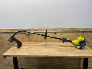lot 22 image: RYOBI 25cc 2-Cycle Attachment Capable Full Crank Curved Shaft Gas String Trimmer
