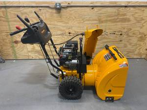 lot 117 image: POULAN PRO PR624ES 24-Inch 208cc LCT Gas Powered Two-Stage Snow Thrower With Electric Start