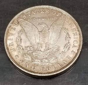 1889 MORGAN SILVER DOLLAR AU