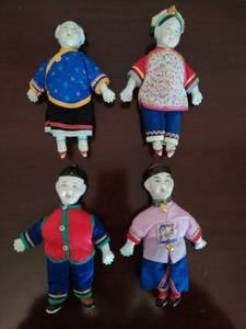 lot 25 image: Collection of Asian Style Porcelain and Cloth Dolls