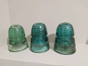 lot 176 image: Three Vintage Glass Electrical Insulators