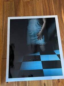 Girl Kneeling on Floor Picture