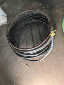 lot 144 image: Hose on a large reel...