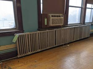lot 411 image: Massive radiator unit roughly 15830. BRING HELP AND TOOLS TO REMOVE
