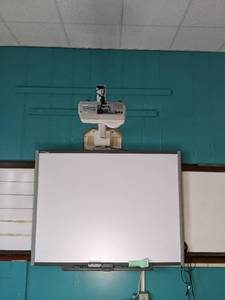 lot 506 image: Epson PowerLite 410W projector on a...
