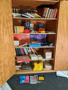 lot 86 image: Cabinet full of music books and oth...