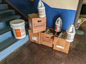 lot 565 image: Large lot of cleaners. 8 gallons of...