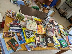 lot 586 image: Several genre books including Guine...