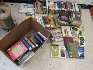 lot 592 image: Several books including Moby Dick, ...