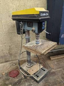 lot 5 image: Delta.drill press set up with sandi...