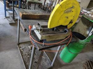 lot 7 image: Makita14 inch cut off saw mounted o...