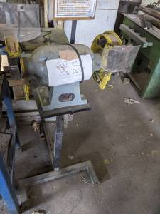 lot 8 image: Bench grinder on stand. Marked out ...