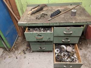 lot 34 image: Vintage work table filled with smal...