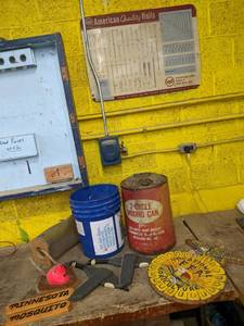lot 46 image: Vintage metal nail sign and can Min...