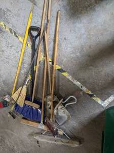 lot 60 image: Lot of brooms shovels and tools...