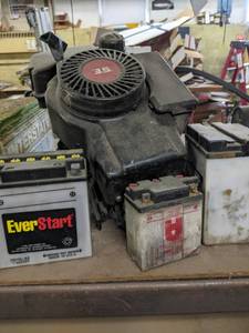 lot 72 image: 3.5 hp engine and misc. batteries...