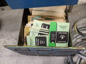 lot 180 image: Metal file cabinet filled with book...
