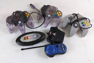 lot 146 image: Lot of (3) N64 Controllers, Walkie Talkie, & More