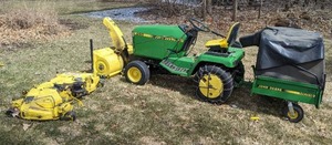 lot 1 image: John Deere 265 with Mower Deck and MC519 Cart Bagger
