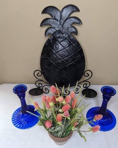 lot 66 image: Home Decor Metal Pineapple Wall Candle Holder, Pair of Blue Glass Candlesticks & Artificial Flower Arrangement