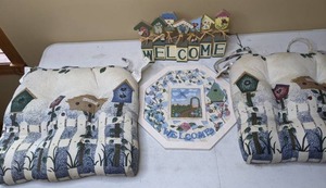 lot 75 image: Matching Blue Birdhouse Themed Chair Cushions (2), Wall Hanging and Welcome Sign
