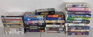 lot 185 image: Collection of 12 DVDs and 24 VHSs Jumanji, Save the Last Dance, Space Jam, and More