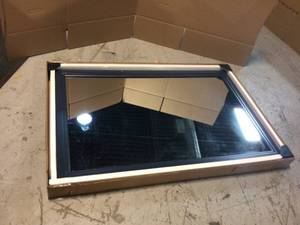 lot 16 image: Sandon 46 in. W x 30 in. H Framed Rectangular Bathroom Vanity Mirror in Midnight Blue by Home Decorators Collection Customer Returns See Pictures