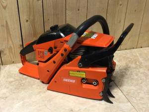 lot 55 image: 24 in. 80.7 cc Gas 2-Stroke Cycle Chainsaw by ECHO For Parts Customer Returns See Pictures