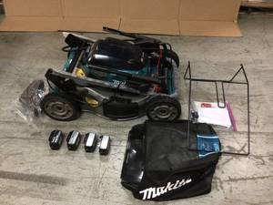 lot 106 image: 21 in. 18-Volt X2 (36-Volt) LXT Lithium-Ion Cordless Walk Behind Self Propelled Lawn Mower Kit with 4 Batteries (5.0 Ah) by Makita Customer Returns See Pictures