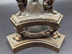 lot 24 image: Bronze and Brass Figural Candleholder