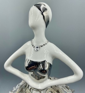 lot 205 image: Porcelain and Metal Figurine