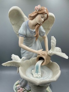 lot 238 image: Hand Painted Porcelain Statue