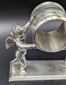 lot 71 image: Meriden Britannia Cherub Napkin Ring (Reproduction)