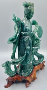 lot 272 image: Faux Jade Figurines with a Wooden Base