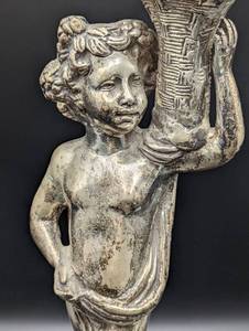 lot 93 image: Silver Child with Basket Sculpture