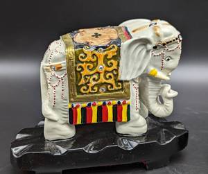 lot 95 image: Pair of Colorful Painted Elephant Figurines