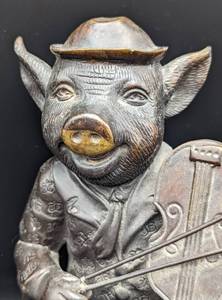 lot 98 image: Bronze Fiddle Playing  Pig Sculpture
