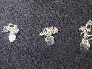 lot 10 image: 3 Silvertone Personalized Heart Cha...